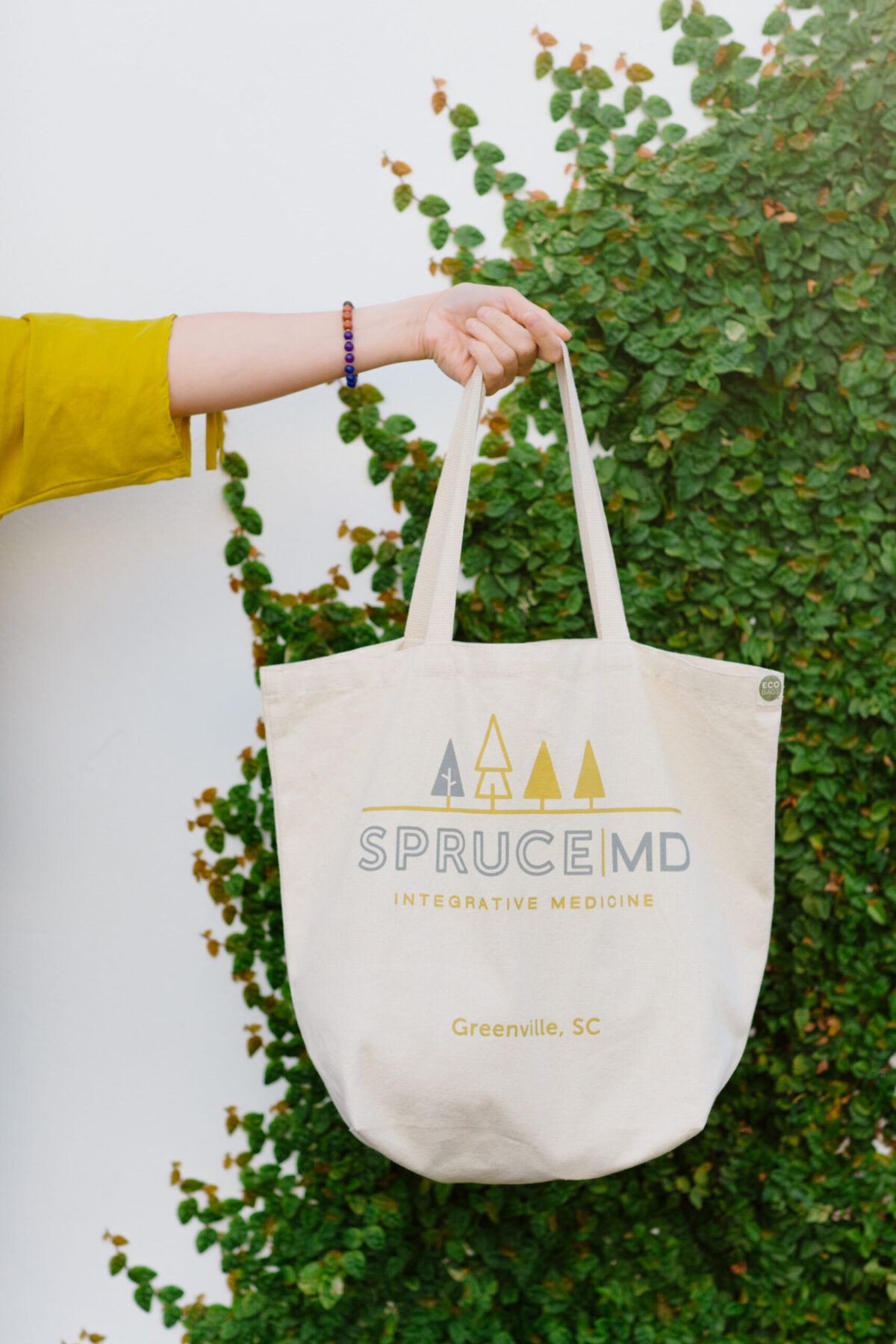 Tote bag with Spruce MD logo